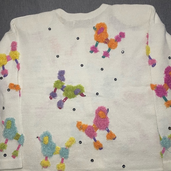 Design Options by Philip & Jane
Gordon Cardigan Sweater L Ramie
Cotton Poodle - Picture 11 of 11